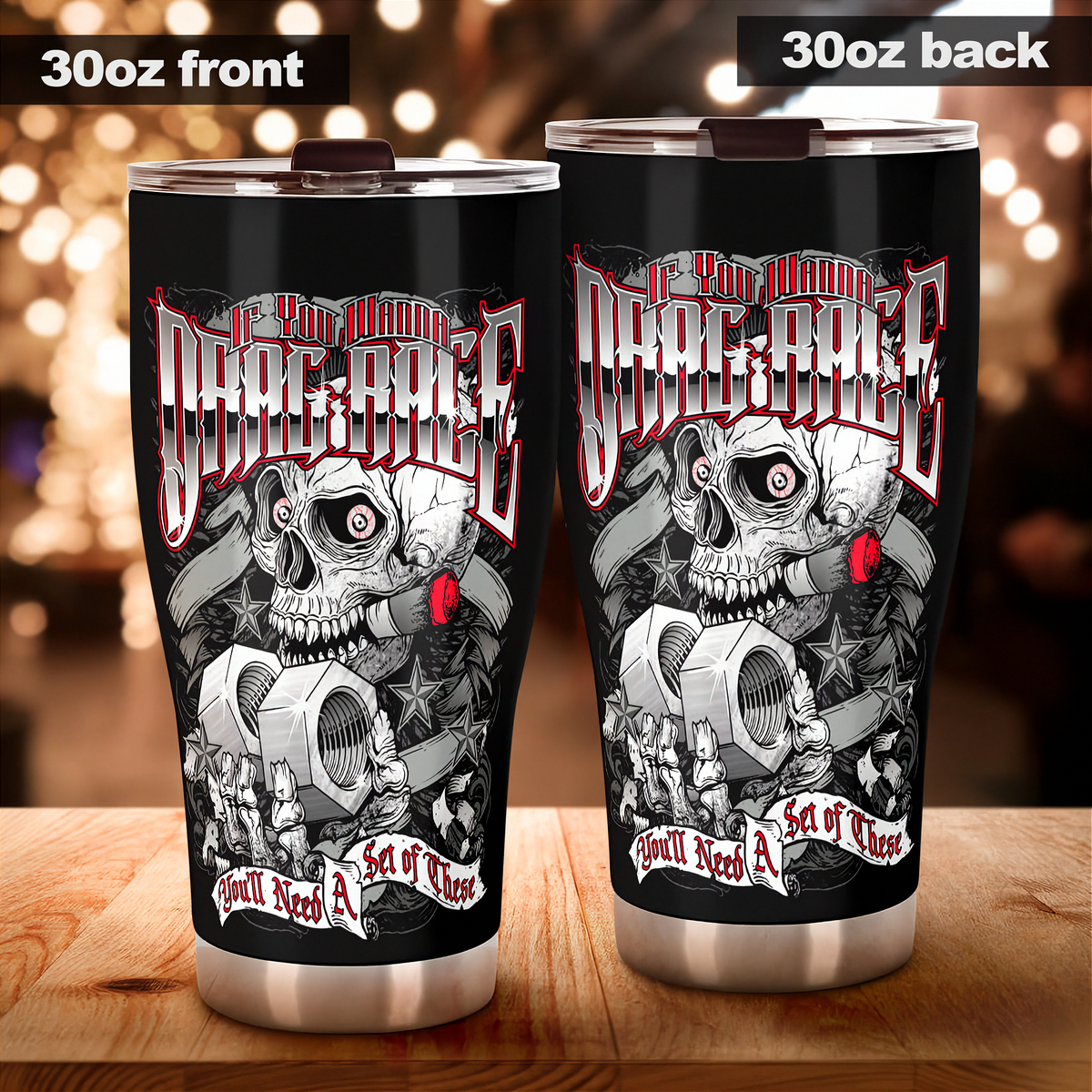 Two 30oz stainless steel travel tumblers shown side by side on a wooden surface, labeled '30oz front' and '30oz back' at the top. The tumblers are black with a large skull-and-gear graphic in white, gray, and red, featuring the text 'If You Wanna To Drag Race You'll Need A Set of These'.