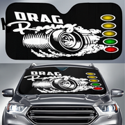 Car sunshade with drag racing design on a vehicle
