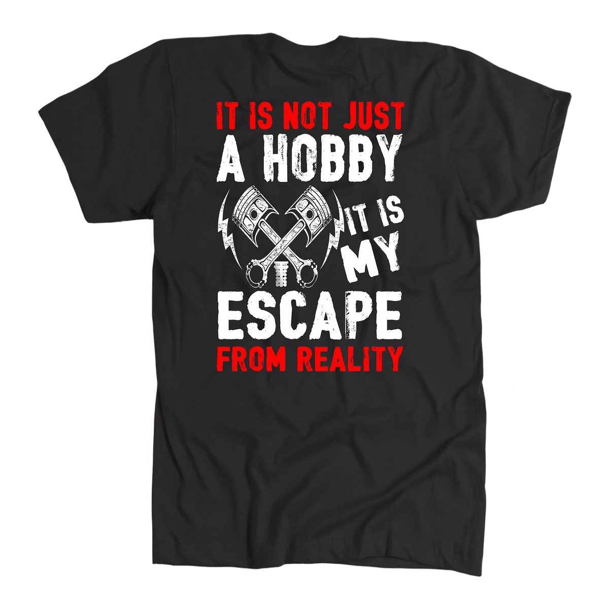 A black short-sleeve t-shirt with a graphic print on the front. The design features crossed pistons and bolts with the text 'IT IS NOT JUST A HOBBY IT IS MY ESCAPE FROM REALITY' in distressed white and red lettering, set against a plain white background.