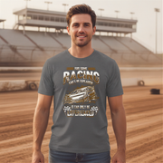 Man wearing a t-shirt with racing graphic and text on a race track background