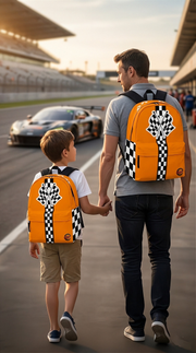 A young driver aged 8 to 12 standing alongside their crew chief instructor next to a bright orange race car in the paddock, both carrying matching custom orange racing track backpacks with adjustable black straps.