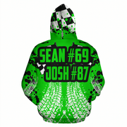A bright green pullover hoodie with a racing-themed graphic print. The design features a black and white checkered pattern on the hood, black paint splatters, white tire tracks, and bold green text reading 'SEAN #69 JOSH #87' outlined in black on the front.