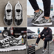 A four-panel collage showing a pair of black and white graphic sneakers from multiple angles and in use. One panel shows the shoes on a concrete surface, one shows them being worn with black pants, one is a close-up of the side graphic, and one shows a person sitting on a stool wearing the shoes in an outdoor setting.