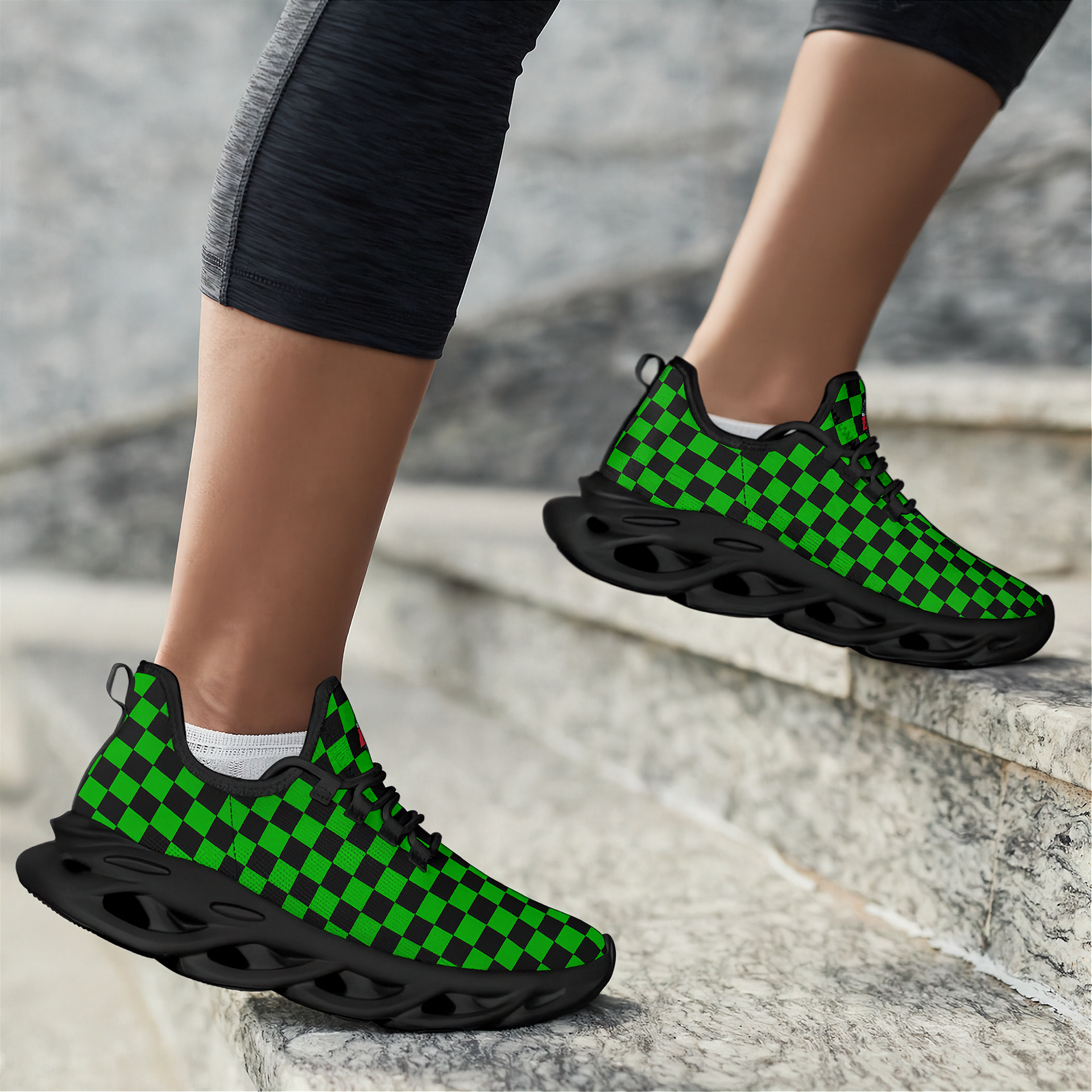 Green and black checkered sneakers worn on a stone staircase.