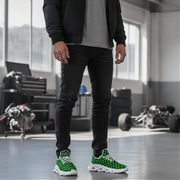 Man wearing black pants and green checkered shoes in a workshop setting