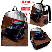 High-performance school and track backpack featuring a vibrant custom black and blue dirt late model racing car graphic, engineered with adjustable ergonomic shoulder straps and a breathable padded mesh back panel.