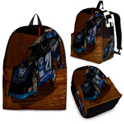 High-performance school and track backpack featuring a vibrant custom black and blue dirt late model racing car graphic, engineered with adjustable ergonomic shoulder straps and a breathable padded mesh back panel.