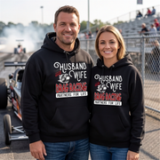 Husband and Wife at a drag strip wearing matching hoodies with text "Husband and Wife Drag Racing partners for life"