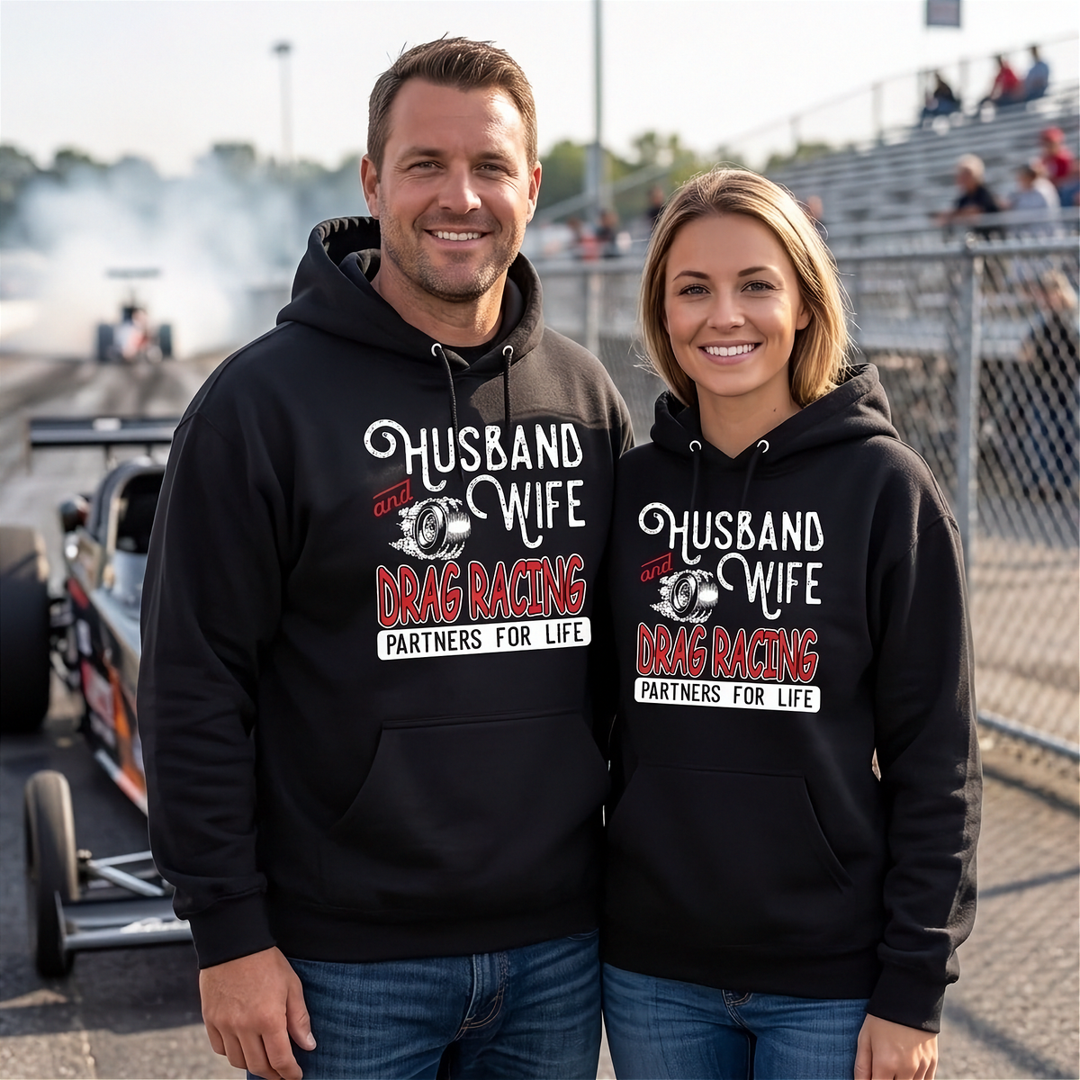 Husband and Wife at a drag strip wearing matching hoodies with text "Husband and Wife Drag Racing partners for life"