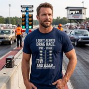 a man at a drag race track wearing a navy shirt with with quote "I Don’t Always Drag Race"