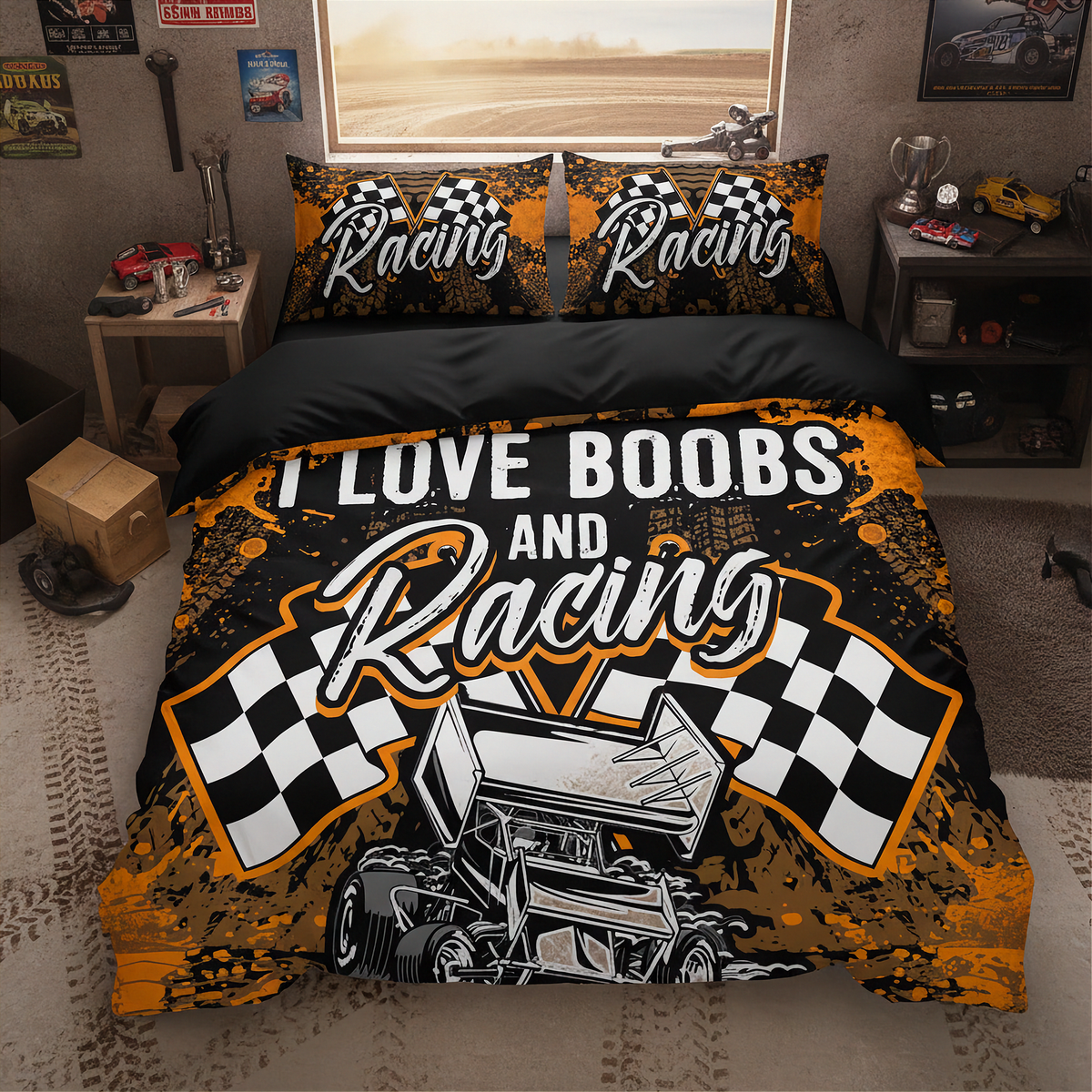 A racing-themed bedding set displayed on a bed in a bedroom. The set includes a duvet cover and two matching pillowcases with a black, orange, white, and gray graphic design featuring the text 'I LOVE BOOBS AND Racing' and a race car illustration with checkered flags.