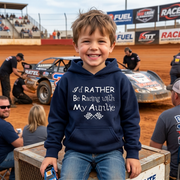 Young boy wearing a navy hoodie with text at a dirt track event