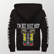 A black pullover hoodie shown from the back, featuring a large graphic print of a drag racing stage control panel with the text 'I'M NOT MOST MEN' above it. The sleeves have vertical white text reading 'DRAG RACING'.