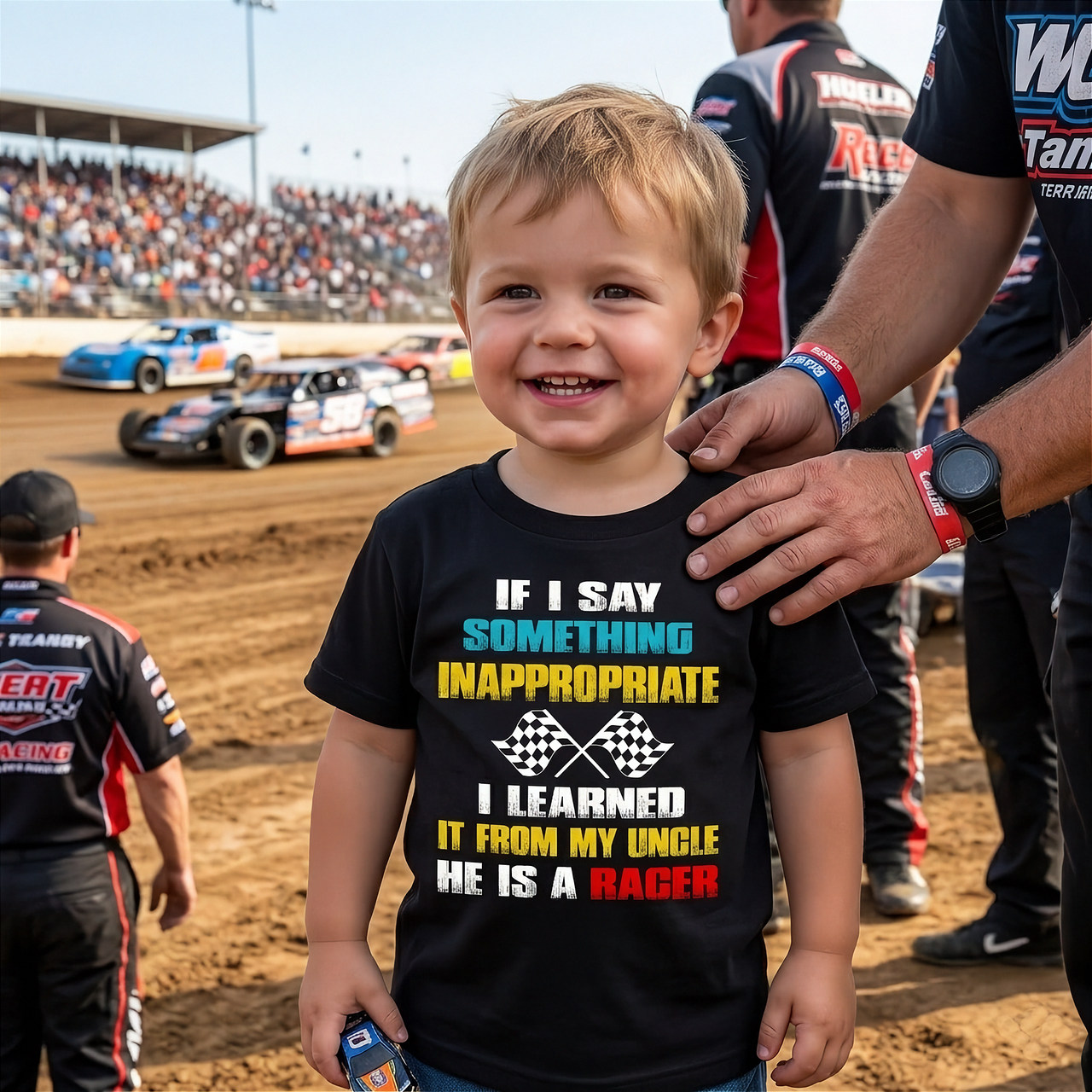 a little kid in a dirt track wearing a shirt with design "If I Say Something Inappropriate, I Learned It From My Uncle" | Kids Racing Tees