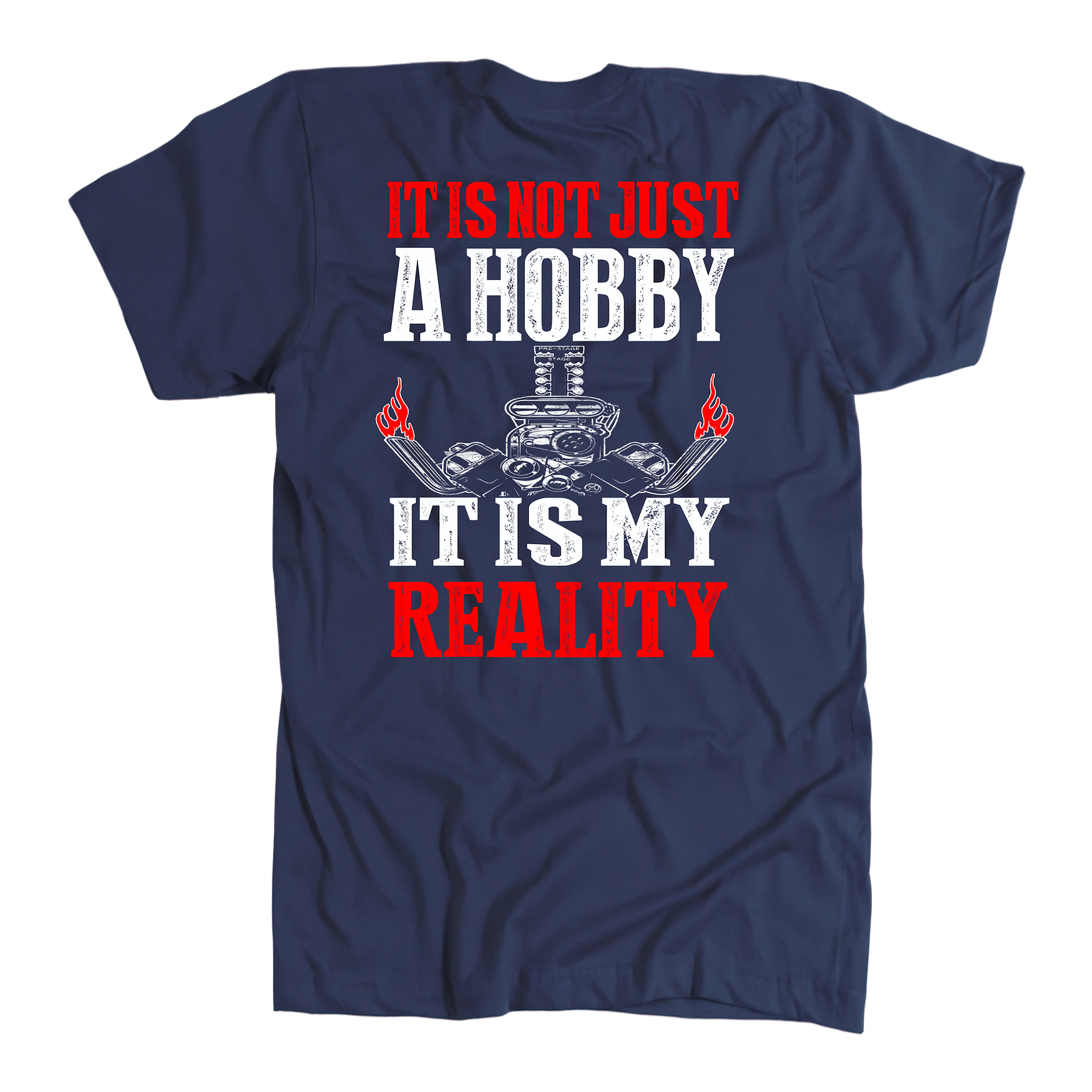 A navy blue short-sleeve t-shirt with a graphic print on the front. The design features the text 'IT IS NOT JUST A HOBBY IT IS MY REALITY' in distressed white and red lettering, with a central white skeleton key graphic and small red flame details, displayed on a clean white background.