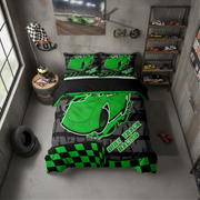 A racing-themed bedding set displayed on a bed in a garage-style bedroom. The set includes a duvet cover and two pillowcases featuring a bright green race car graphic on a black background with a green and black checkered stripe at the bottom.