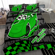 A racing-themed bedding set featuring a green race car and checkered flag patterns on a black and gray background, shown on a bed in a modern bedroom setting.