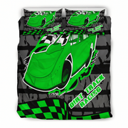 A racing-themed bedding set featuring a duvet cover and two matching pillowcases with a bold green race car graphic, black and gray track patterns, checkered flags, and the words 'Dirt Track Racing'.