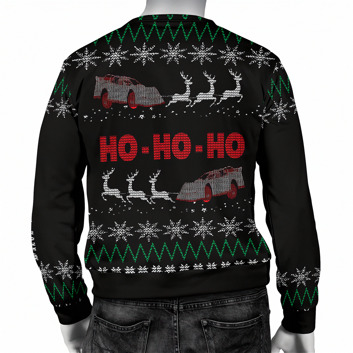 A black Christmas sweater with a festive holiday pattern, featuring red 'HO-HO-HO' text, white snowflakes, green zig-zag stripes, and red-and-white sledding cars with reindeer. The image shows the back view of the sweater on a mannequin torso against a white background.