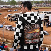 Man overlooking a dirt oval in a custom late model sherpa jacket with gray-and-red car artwork, number 33, and “YOUR NAME.”