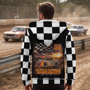Man watching stock cars at a dirt track, showing the personalized car, name, and number design on his jacket back.