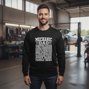 Man wearing a black sweatshirt with mechanic dad in a garage