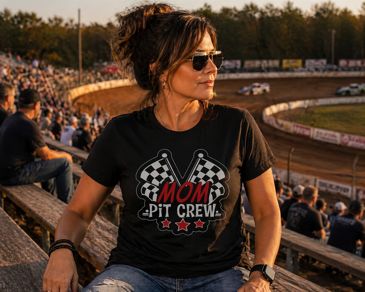Mom Pit Crew apparel collection featuring premium women's t-shirts, lightweight racerback tanks, soft v-necks, and cozy fleece hoodies designed for racing families.