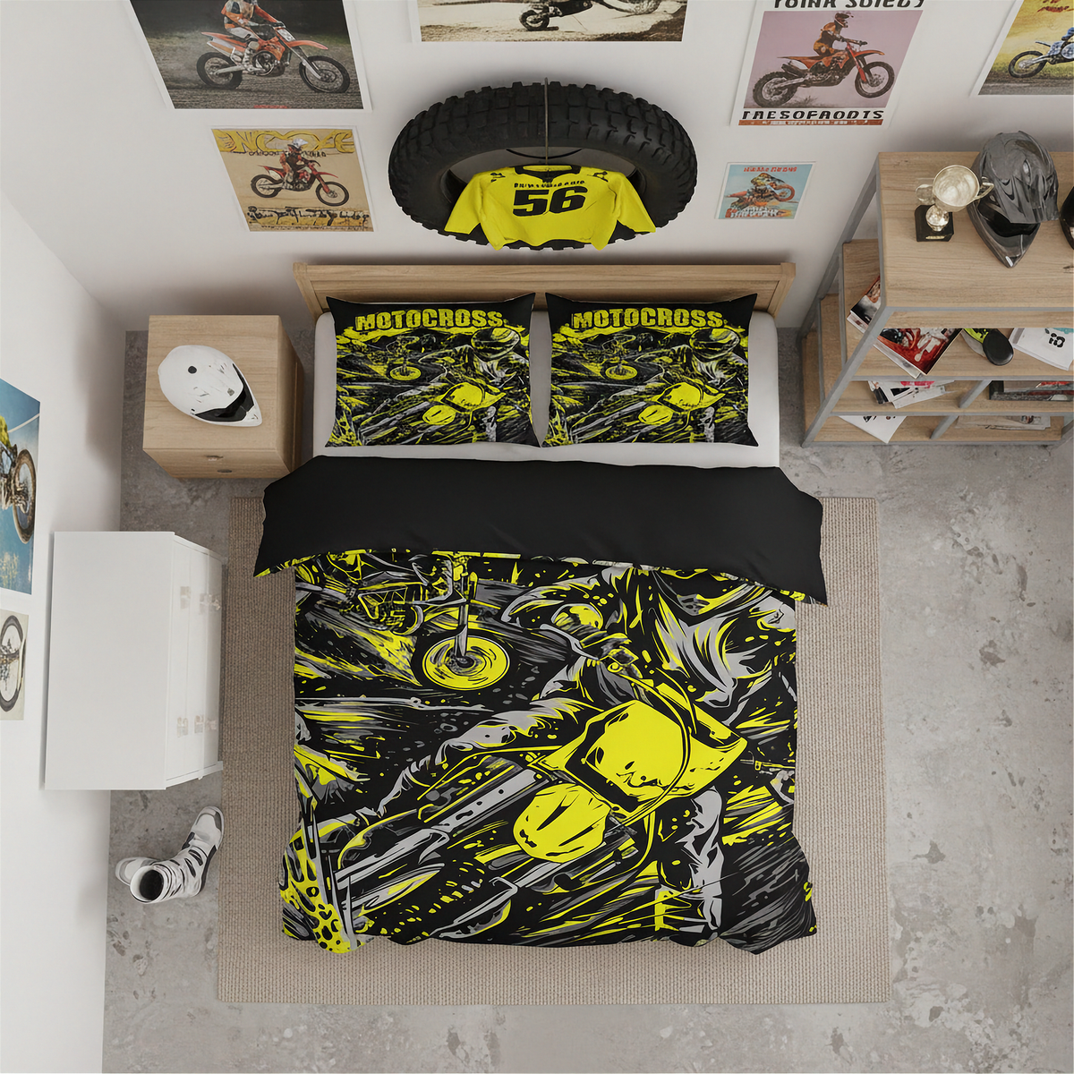 A top-down bedroom scene showing a bed made with a motocross-themed bedding set. The duvet cover and two pillowcases have a bold black, neon yellow, and gray graphic print featuring a motorcycle and the word 'MOTOCROSS' across the top.