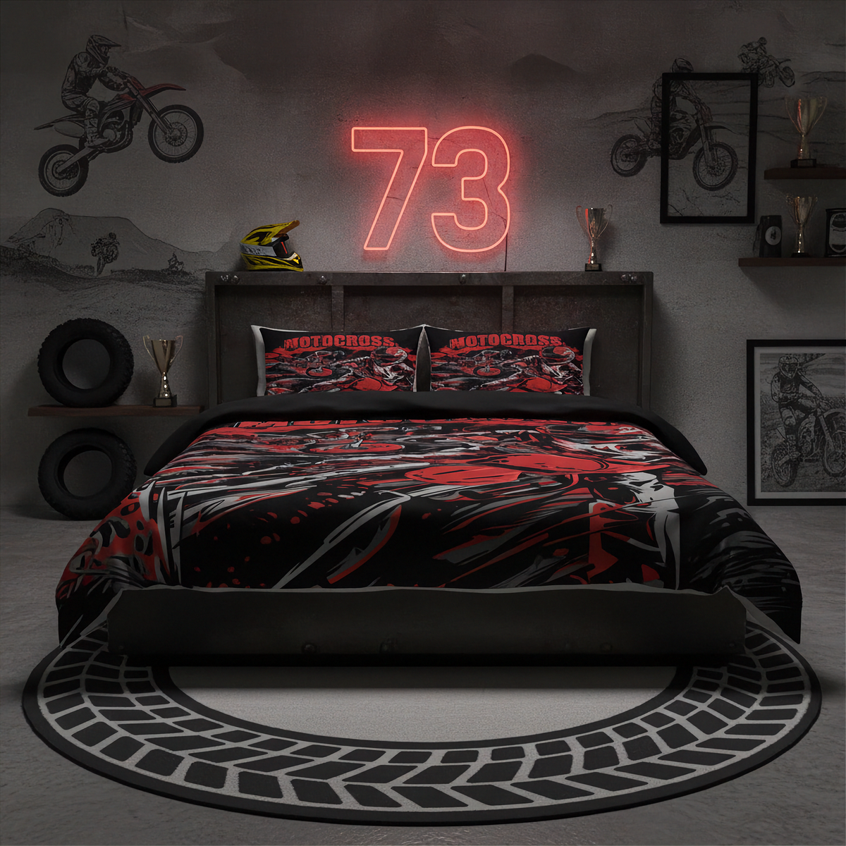 A motorcycle-themed bedding set displayed on a bed in a styled room. The set includes a duvet cover and two pillowcases with a red, black, and gray graphic pattern featuring a motorcycle and the word 'MOTOCROSS'.