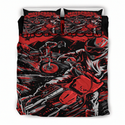 A motocross-themed bedding set featuring a duvet cover and two pillowcases with a bold red and black graphic print of riders on bikes, shown against a plain white background.