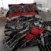 A motocross-themed bedding set featuring a duvet cover and two pillowcases with a bold graphic print of a rider, motorcycle, and the word 'MOTOCROSS' in red, shown on a bed in a modern bedroom setting.