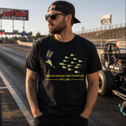 Motorsports apparel featuring the quote "And So Began The Story Of My Life Drag Racing", available in premium men's and women's t-shirts, tanks, and warm hoodies.