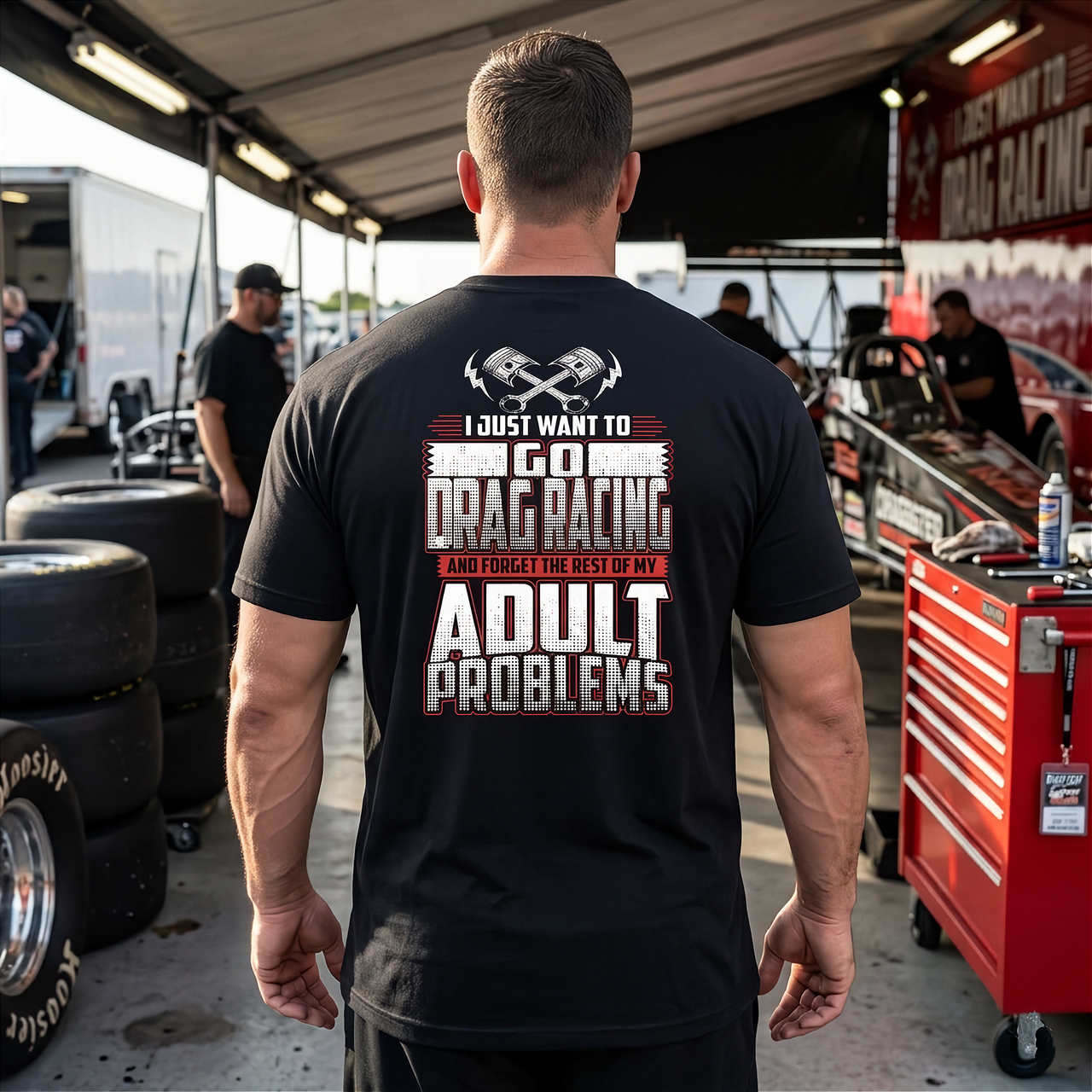 Motorsports t-shirt with the phrase "I Just Want To Go Drag Racing And Forget The Rest Of My Adult Problems," available in multiple styles including slim-fit cotton and fleece hoodies.