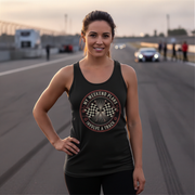 Woman wearing a tank top with a racing graphic on a race track
