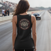 Woman wearing a black tank top with a graphic design on a race track
