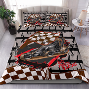 A bed dressed with a dirt track racing themed bedding set, featuring a large graphic of a race car, checkered flags, and 'DIRT TRACK RACING' text on a gray and black distressed background. The set includes a duvet cover and two matching pillowcases, shown in a styled bedroom setting.
