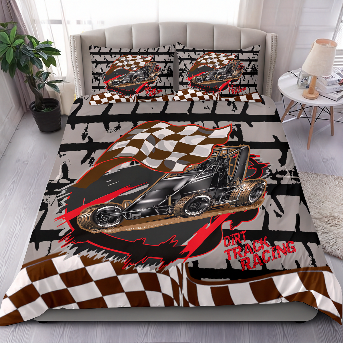 A bed dressed with a dirt track racing themed bedding set, featuring a large graphic of a race car, checkered flags, and 'DIRT TRACK RACING' text on a gray and black distressed background. The set includes a duvet cover and two matching pillowcases, shown in a styled bedroom setting.