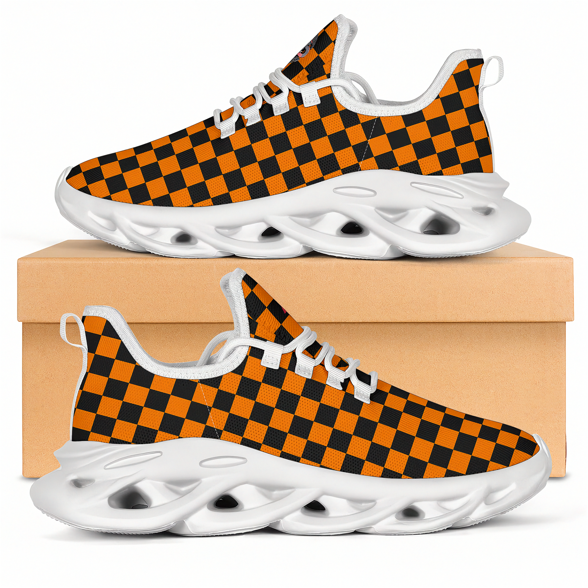 Orange and black checkered sneakers with white soles on a beige box.