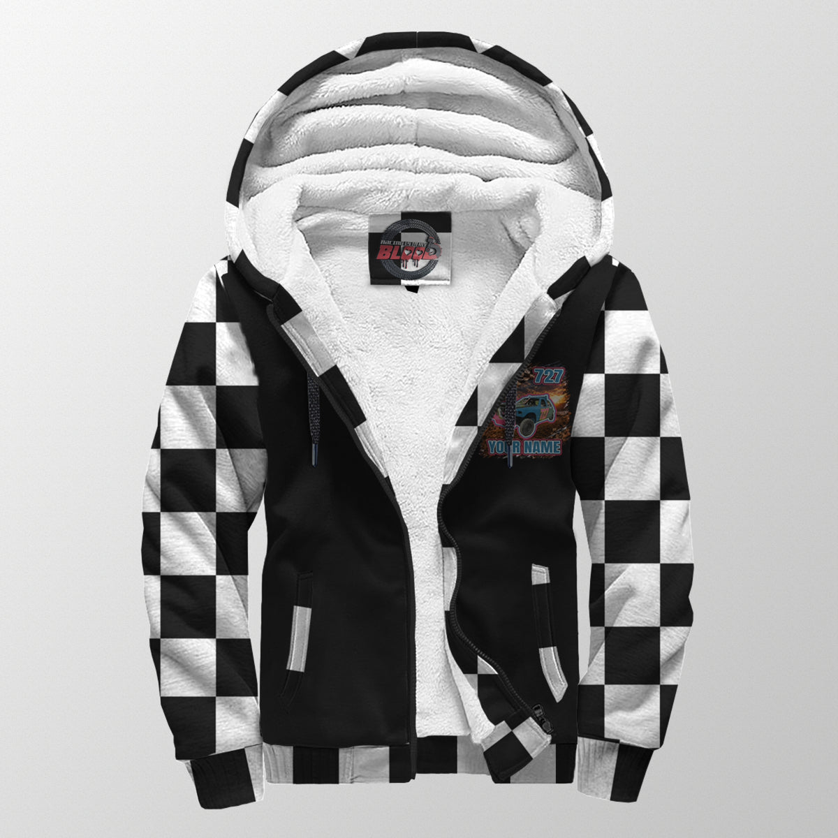 Front of demolition derby sherpa jacket unzipped to show white sherpa lining, custom chest graphic, hood, and two pockets.