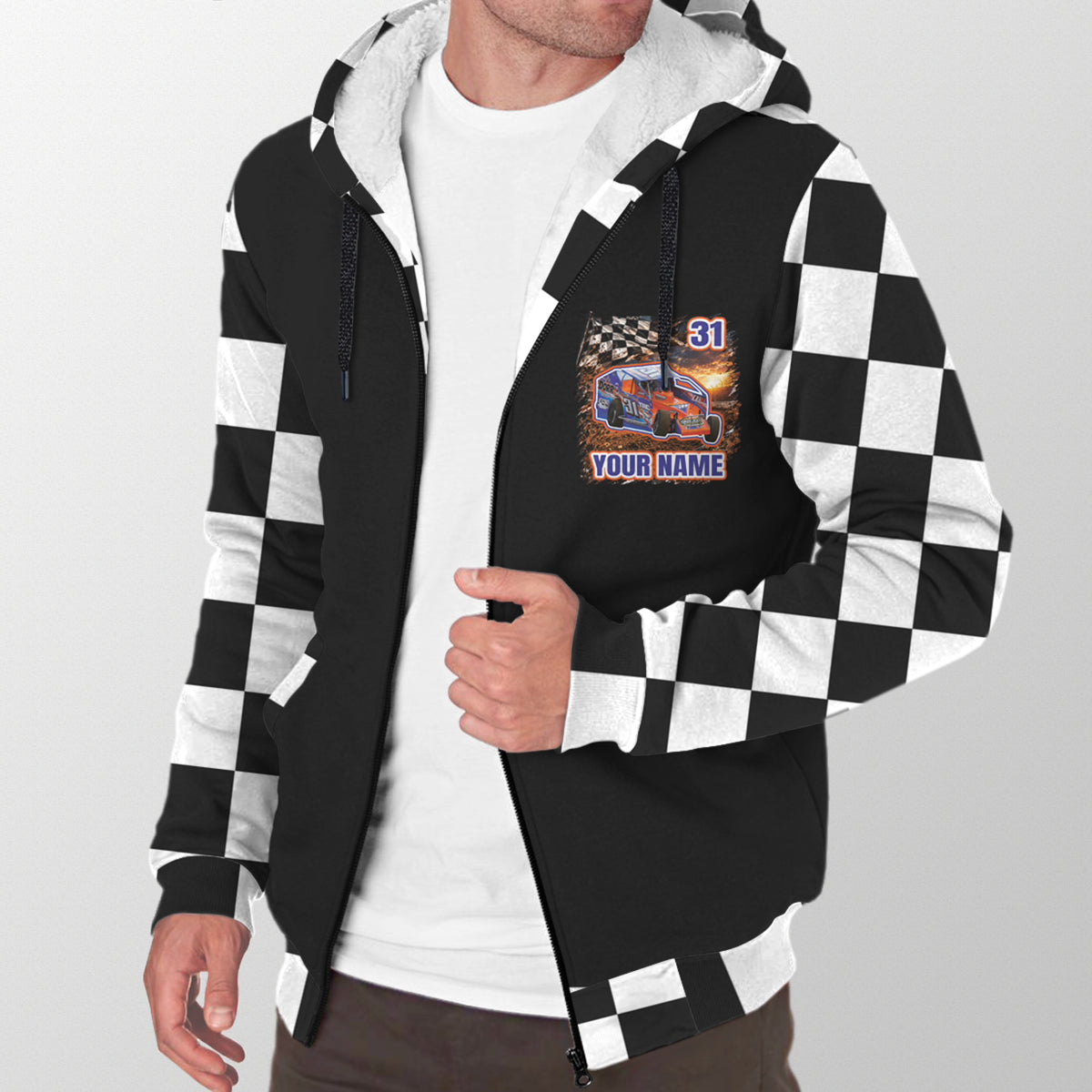 Man modeling a black dirt modified sherpa jacket with personalized chest artwork, checkered sleeves, and white lining.