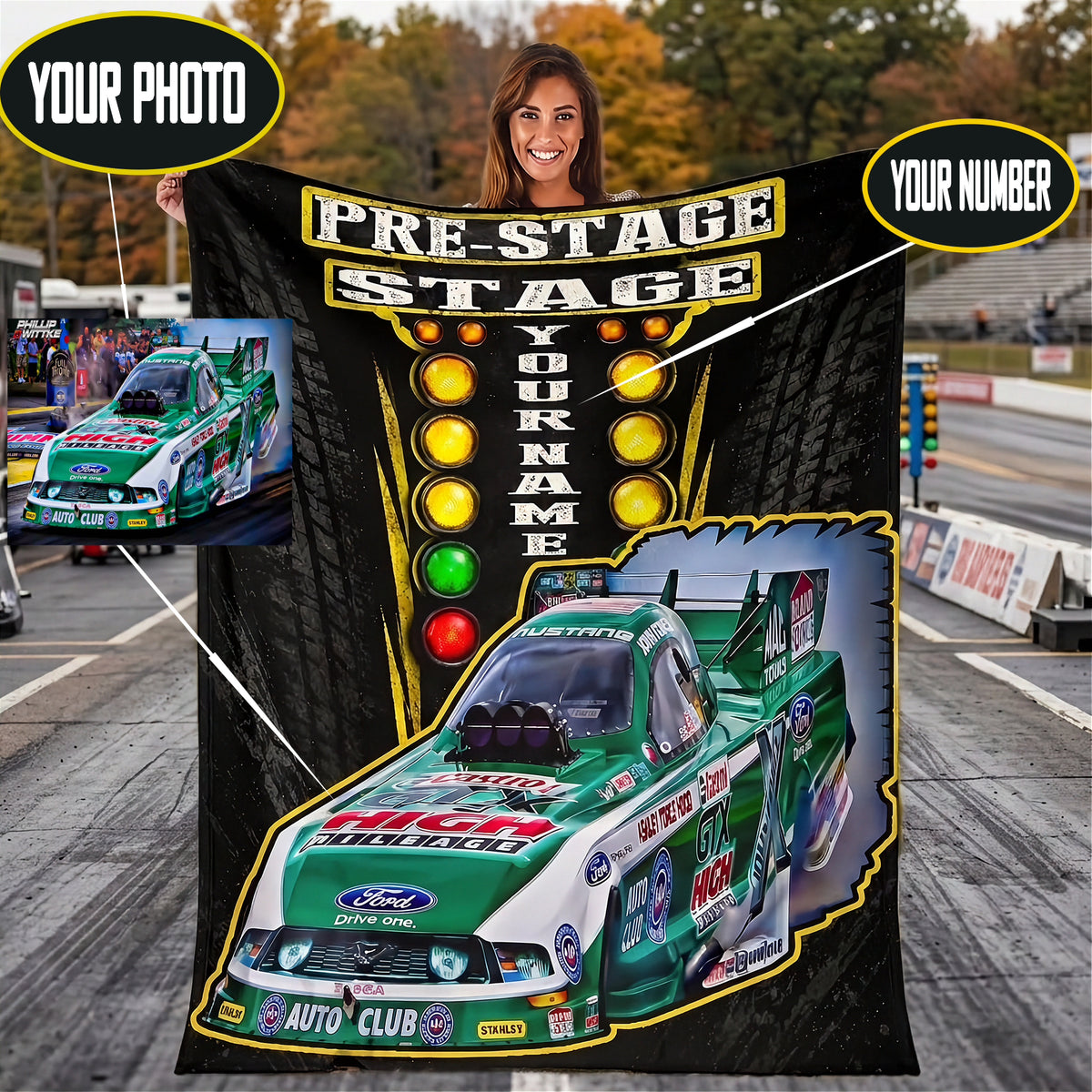 A custom pre-stage race blanket featuring a green and white Ford race car, a vertical row of yellow, amber, and red stage lights, and the text 'PRE-STAGE STAGE' and 'YOUR NAME'. The blanket is held by a woman on a racetrack, with two circular callouts showing a photo and number customization options.