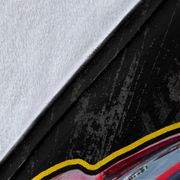 Abstract close-up artwork with a large white textured area, a black textured central section, a thin yellow curved line, and a small red and blue area at the bottom right.