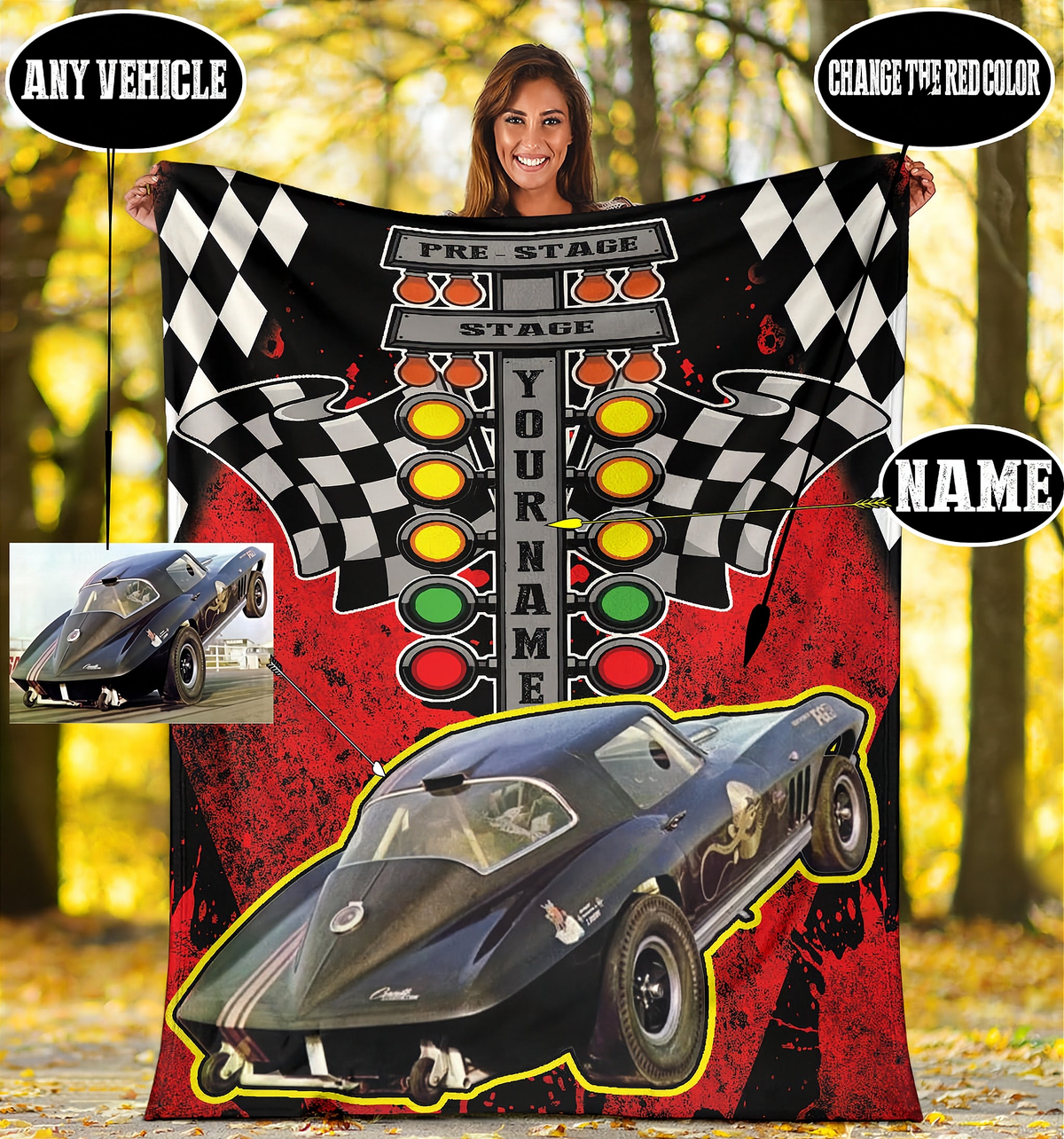 A woman stands outdoors in a wooded area holding a large custom racing-themed blanket or poster. The product features a black and red graphic design with checkered flags, a race track lights sequence, and a large black race car illustration.