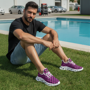 Man sitting by a pool wearing black checkered shoes