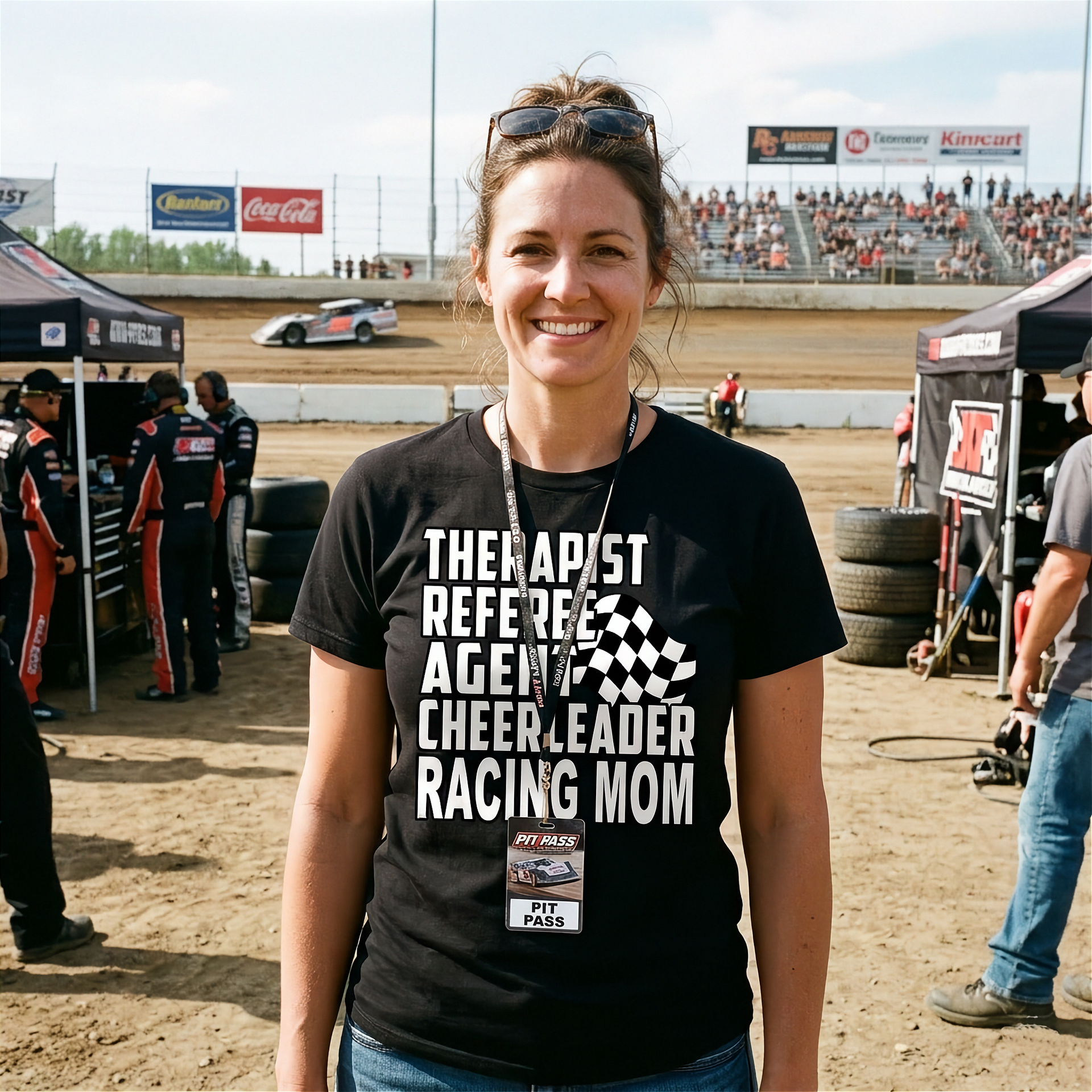 Premium black women's t-shirt mockup featuring a clean white graphic layout listing "THERAPIST REFEREE AGENT CHEERLEADER RACING MOM" paired with a classic checkered flag icon.