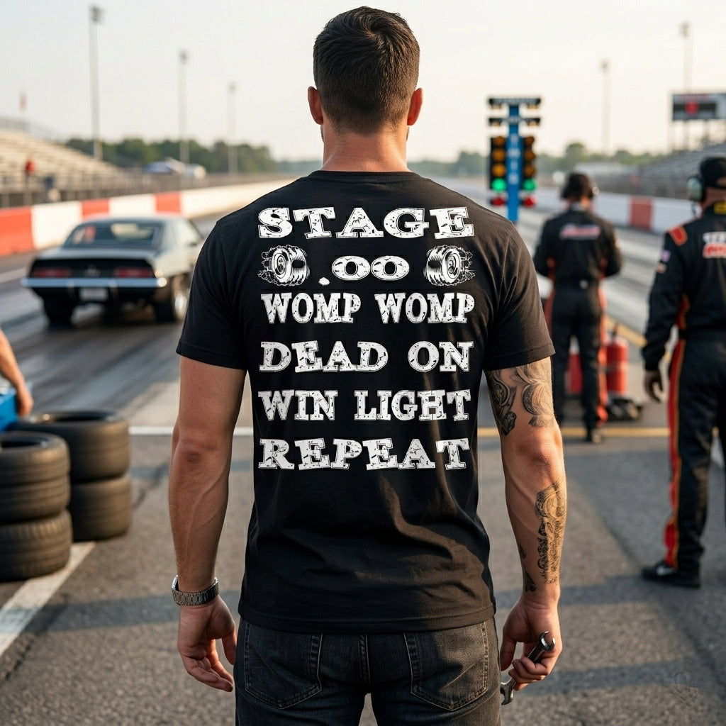 Premium motorsports apparel featuring the "Burnout Stage" design, available in various styles including soft-spun cotton tees and racerback tanks.