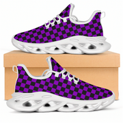 Purple and black checkered sneakers with white soles on a beige box.