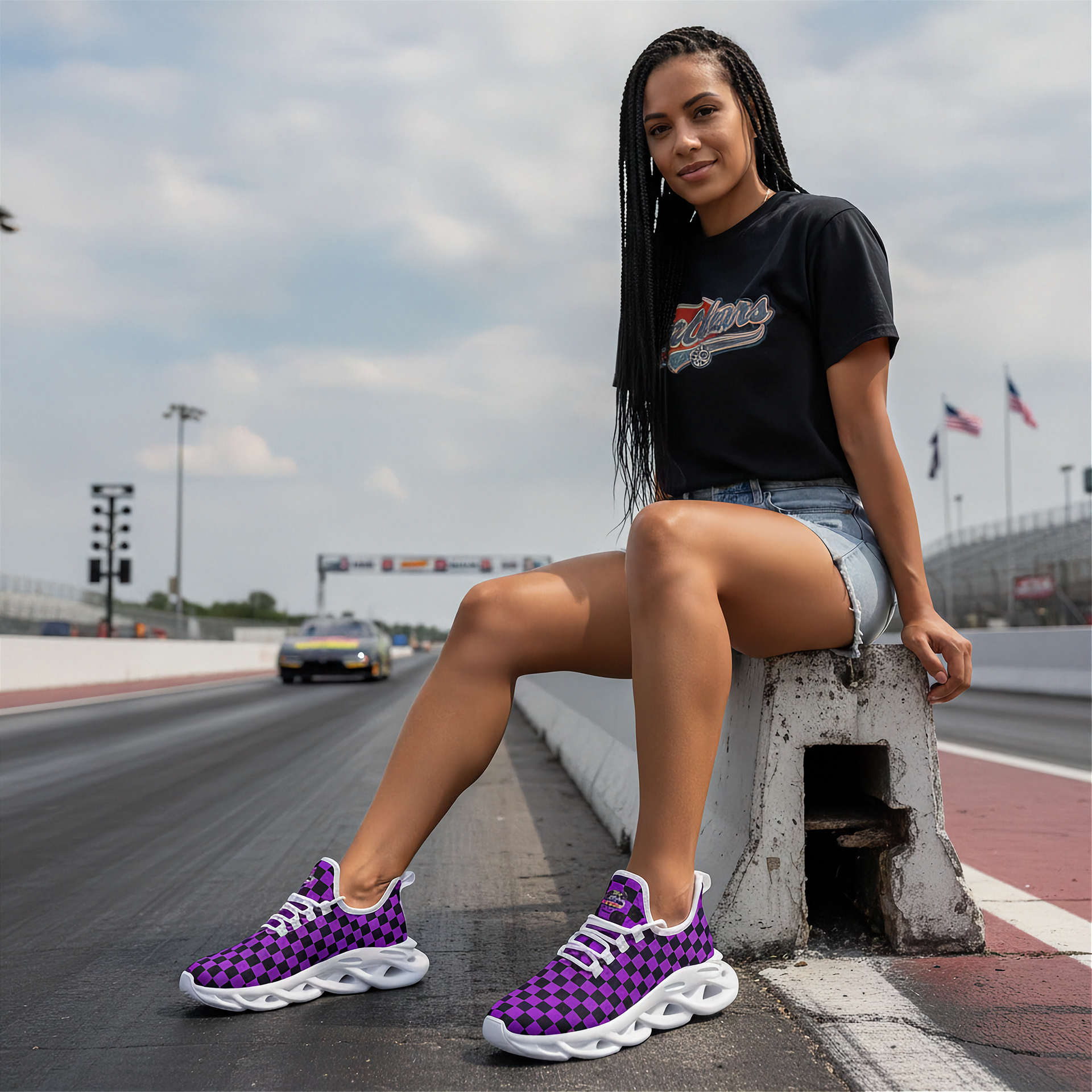 Woman sitting on a track with purple checkered sneakers