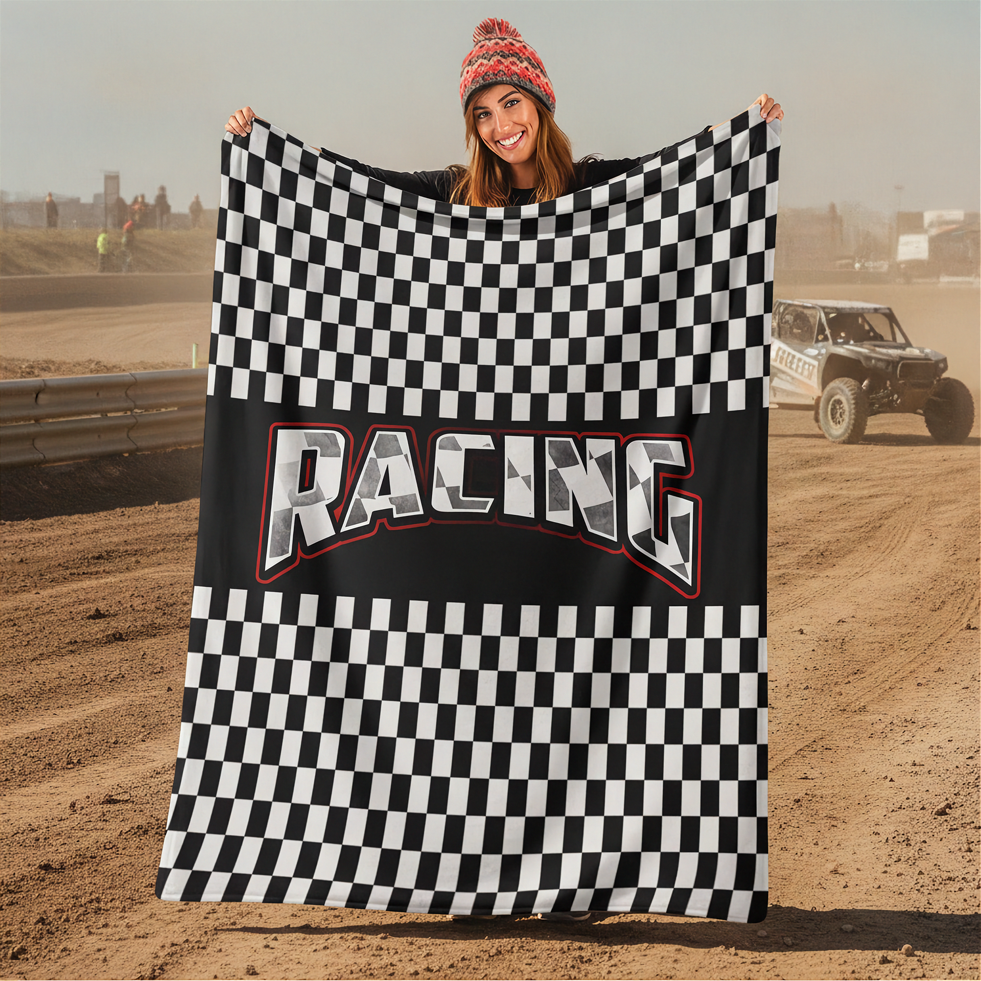 Woman holding a checkered racing flag with 'Racing' text on a dirt track background