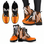 Woman wearing a checkered pattern orange boots with other two simillar boots next to it